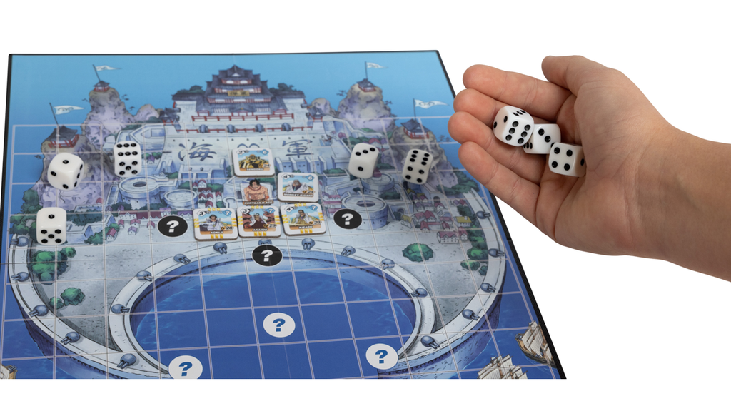 Vue du plateau et des dés du jeu de société One Piece Assaut sur Marine Ford de Topi Games